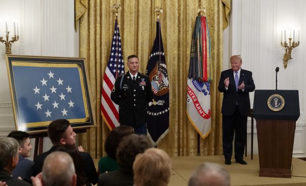 President Donald Trump applauds