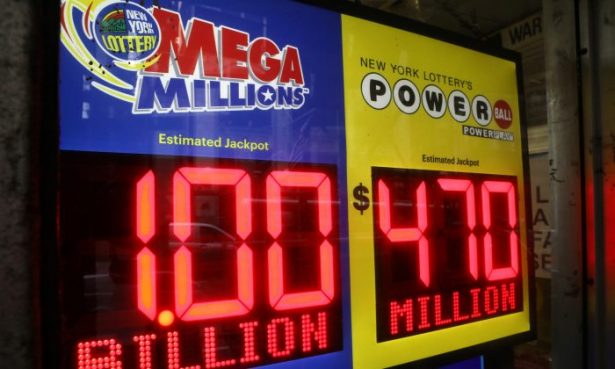 File photo of signs displaying the jackpots for Mega Millions