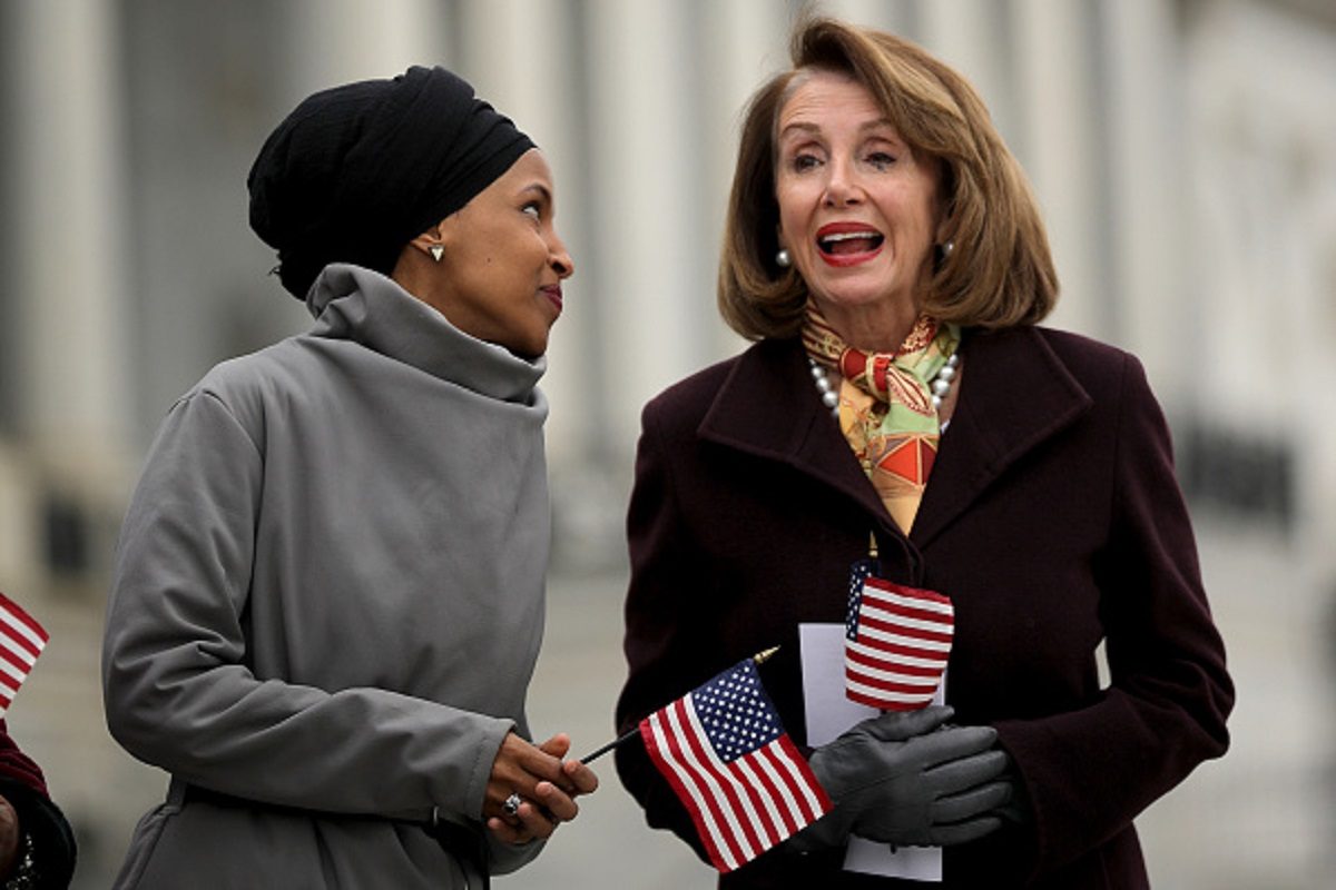 Rep. Ilhan Omar (D-MN) (L) talks with Speaker of the House Nancy Pelosi