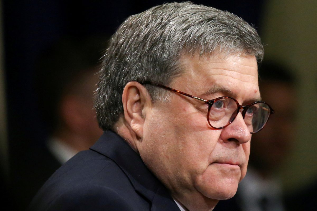 FILE PHOTO: U.S. Attorney General Barr attends a farewell ceremony for Deputy Attorney General Rosenstein at the U.S. Department of Justice in Washington