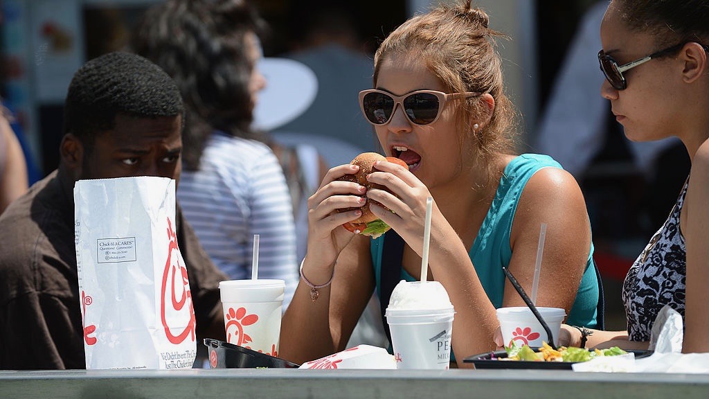 Woman eats Chick-fil-A