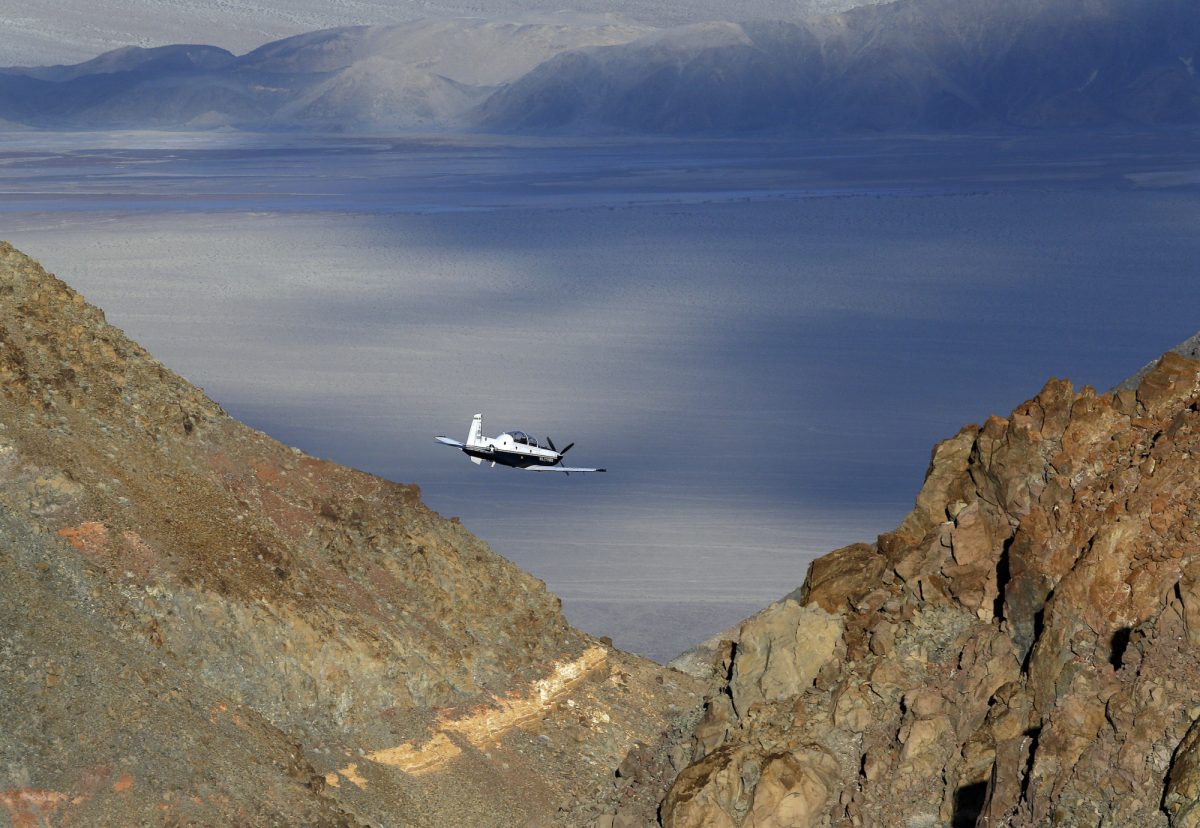 Plane flying in Death Valley