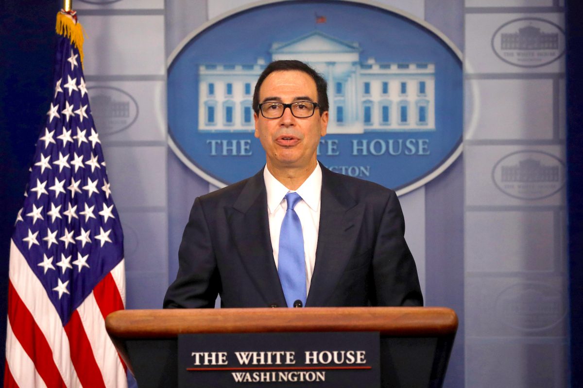 Stocks slide as rate cuts stoke fear of an economic slowdown