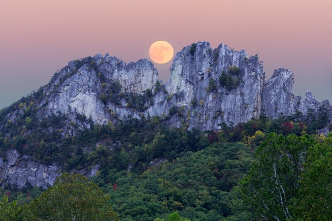A supermoon rises over Seneca Rocks in Pendleton County, W. Va. (Steve Heap/Shutterstock)