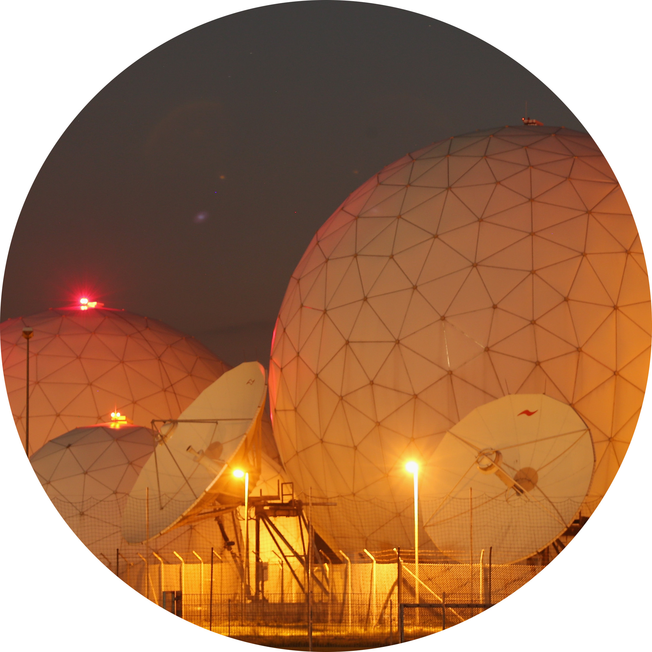 Radomes of the digital communications listening station of the Bundesnachrichtendienst (BND), the German intelligence agency, stand at night in Bad Aibling, Germany on June 2, 2015.(Sean Gallup/Getty Images)